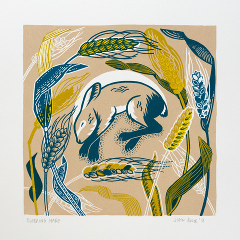 A three colour screenprint of a sleeping young hare amongst ears of wheat. It is in blue, yellow and brown.